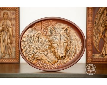Carved panel Wolves