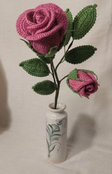 Knitted crimson rose