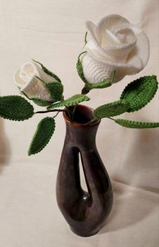 White knitted rose